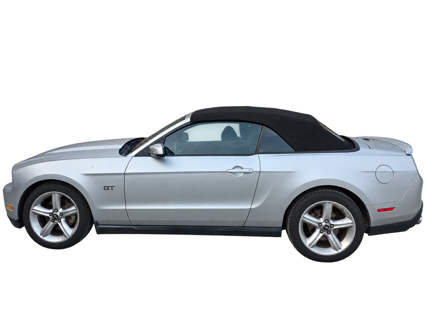 Silver Mustang with a replacement black convertible top