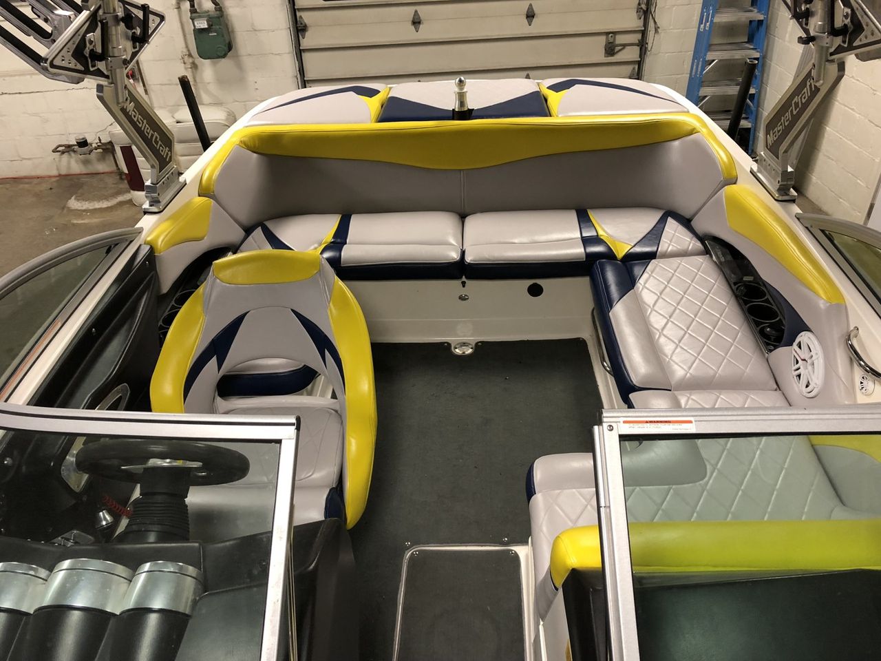 View Custom yellow and navy marine upholstery